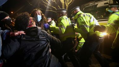 People clash with police during a gathering at a memorial site in Clapham Common Bandstand, following the kidnap and murder of Sarah Everard, in London, Britain March 13, 2021. REUTERS/Hannah McKay  